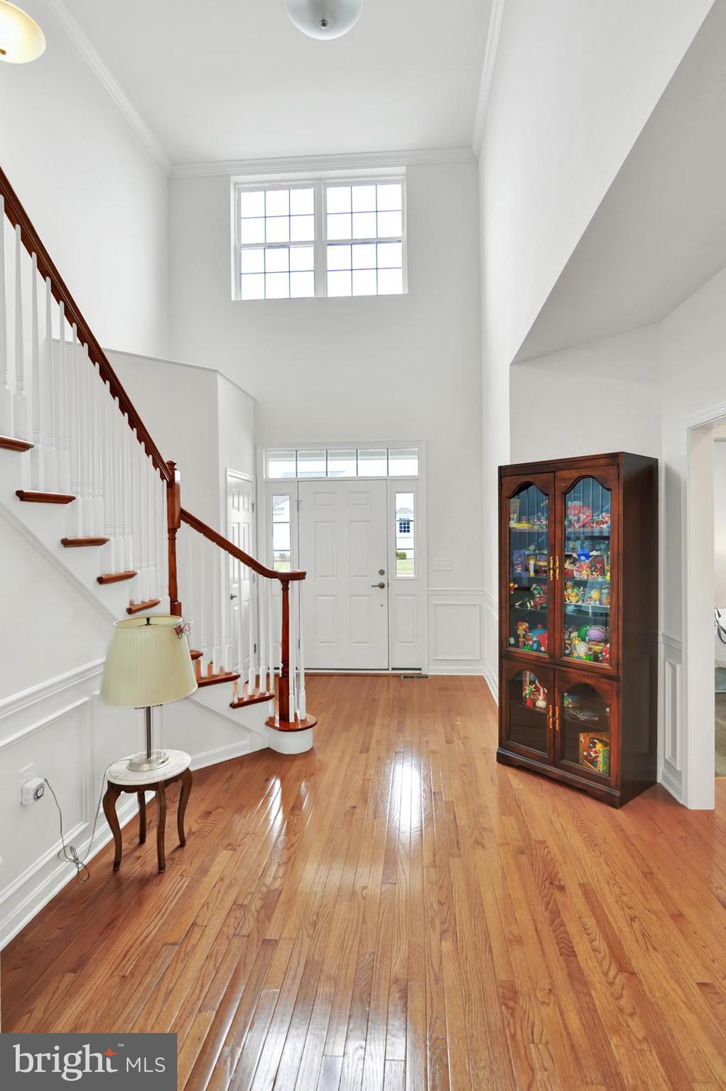 37 Spring Arbor Drive Middletown, DE 19709 - Photo 8 of 37 a view of entryway and hall with wooden floor