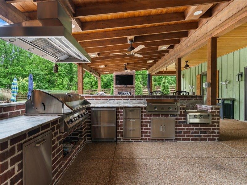 8104 Jack Bond Road Arlington, TN 38002 - Photo 27 of 40 a view of an outdoor kitchen