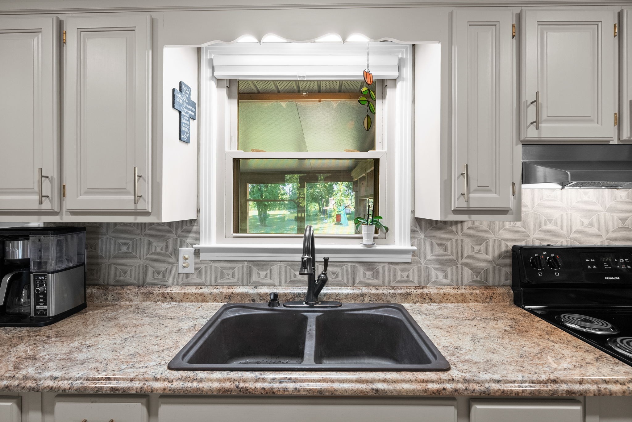 3680 Zentmyer Road Crofton, KY 42217 - Photo 13 of 43 a kitchen with granite countertop a sink and a stove