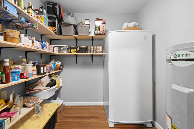 a room with storage and utility