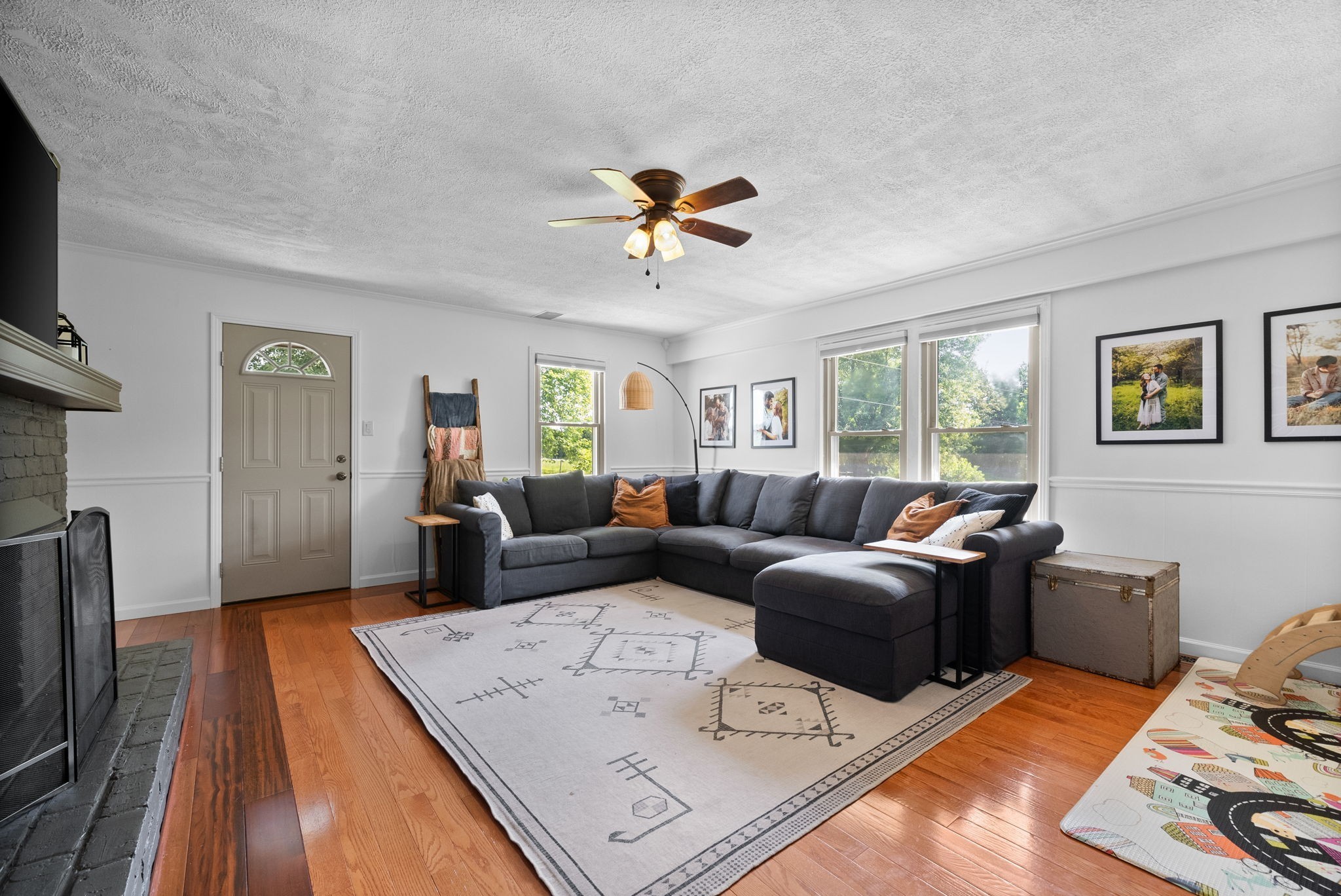 3680 Zentmyer Road Crofton, KY 42217 - Photo 17 of 43 a living room with furniture windows and a flat screen tv