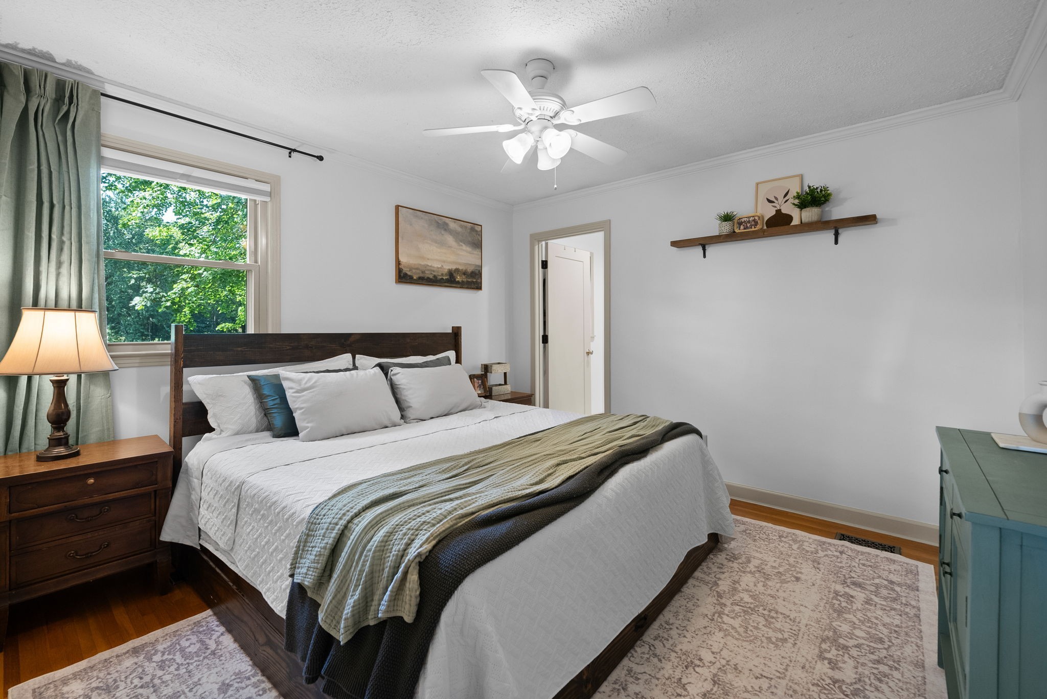 3680 Zentmyer Road Crofton, KY 42217 - Photo 21 of 43 a bed room with a bed and a chandelier