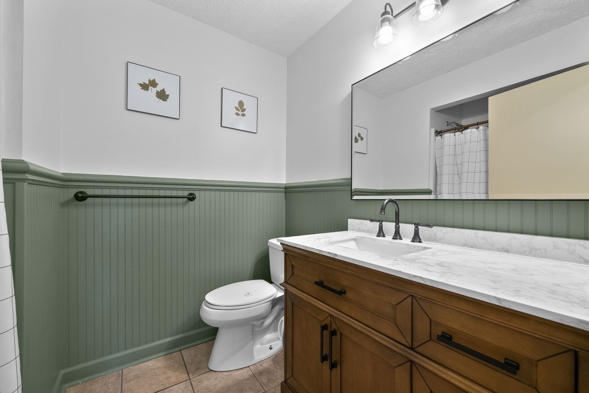 3680 Zentmyer Road Crofton, KY 42217 - Photo 29 of 43 a bathroom with a toilet sink and mirror
