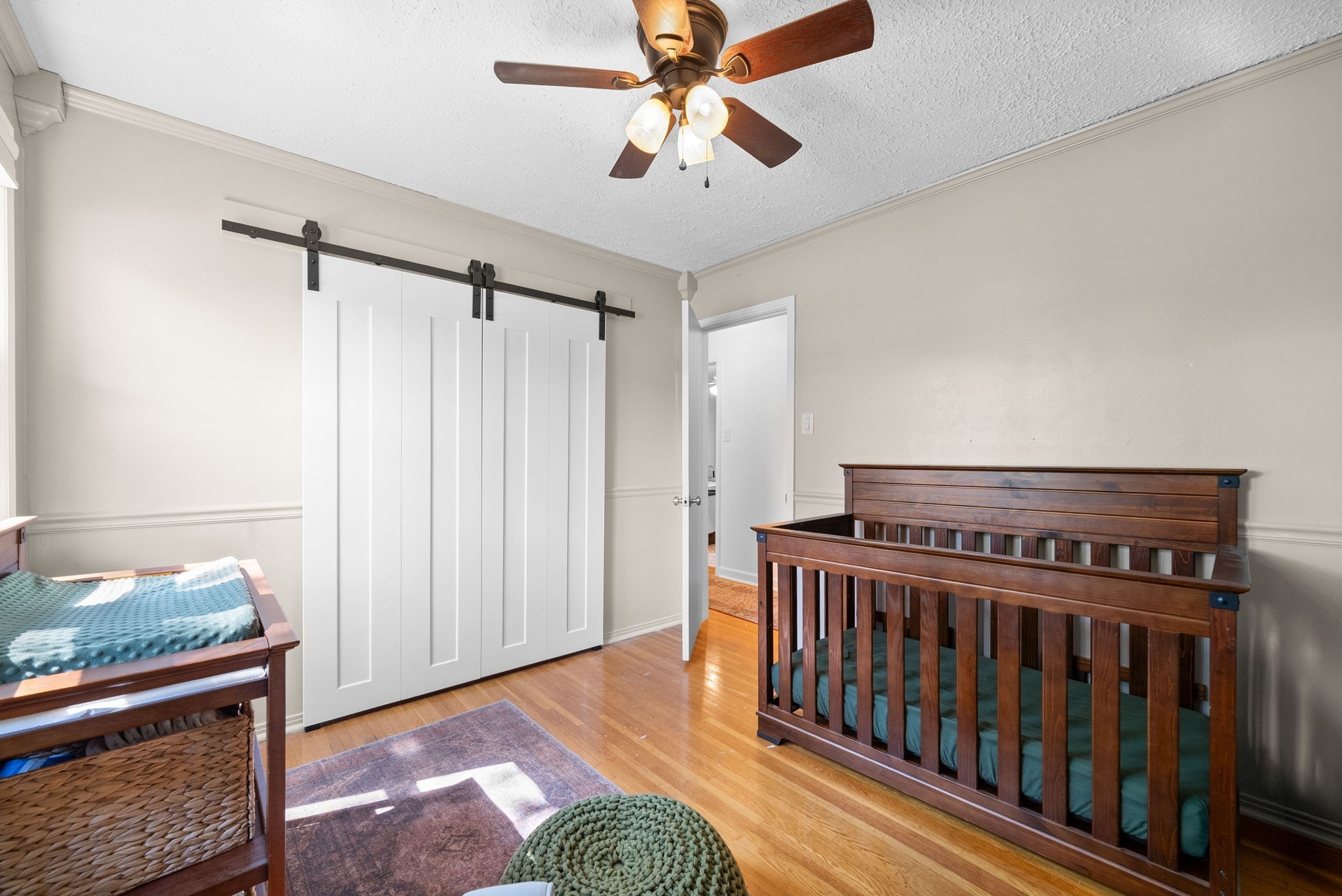 3680 Zentmyer Road Crofton, KY 42217 - Photo 31 of 43 a view of a bedroom with furniture and wooden floor