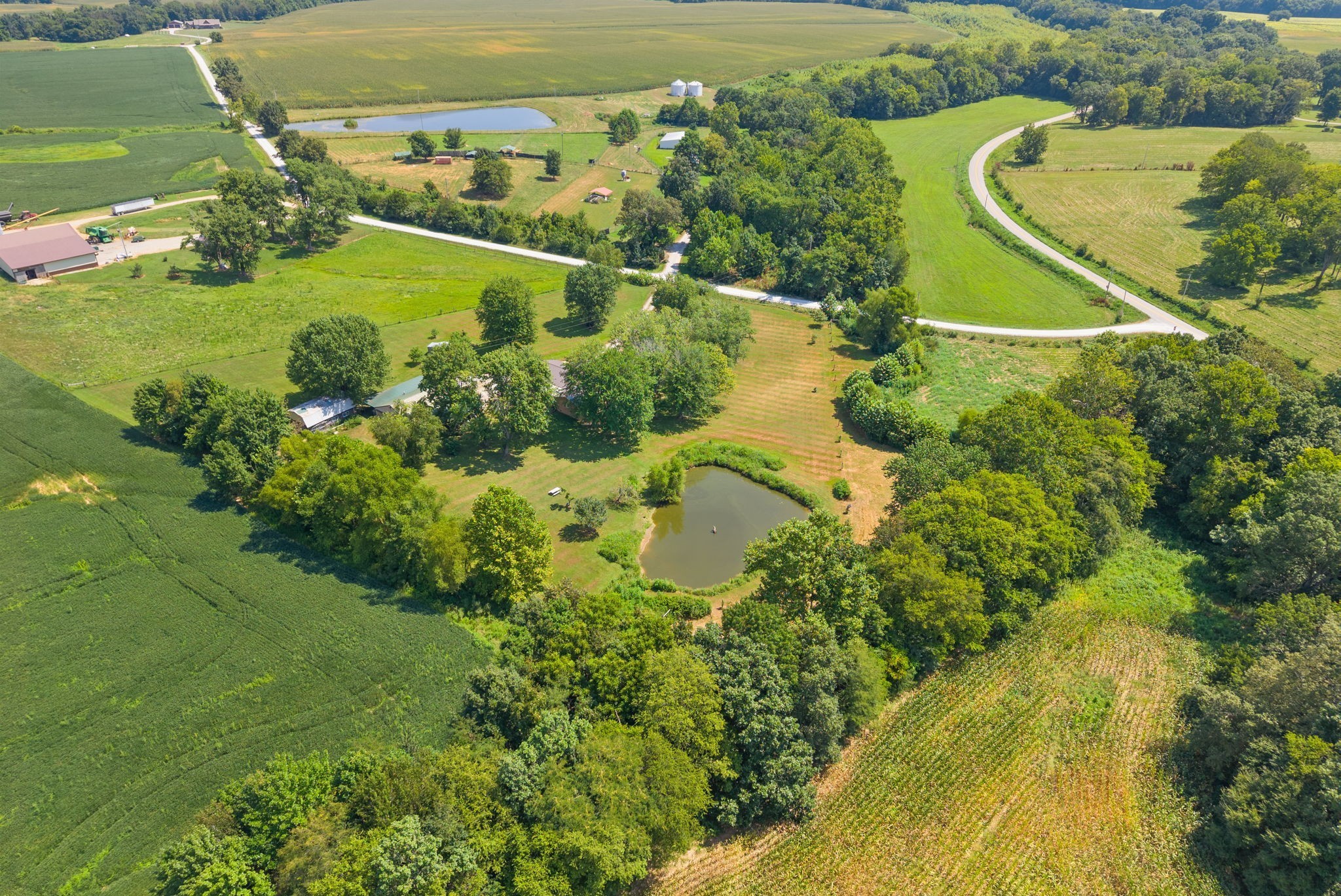 3680 Zentmyer Road Crofton, KY 42217 - Photo 40 of 43 an aerial view of a residential houses with outdoor space and trees all around
