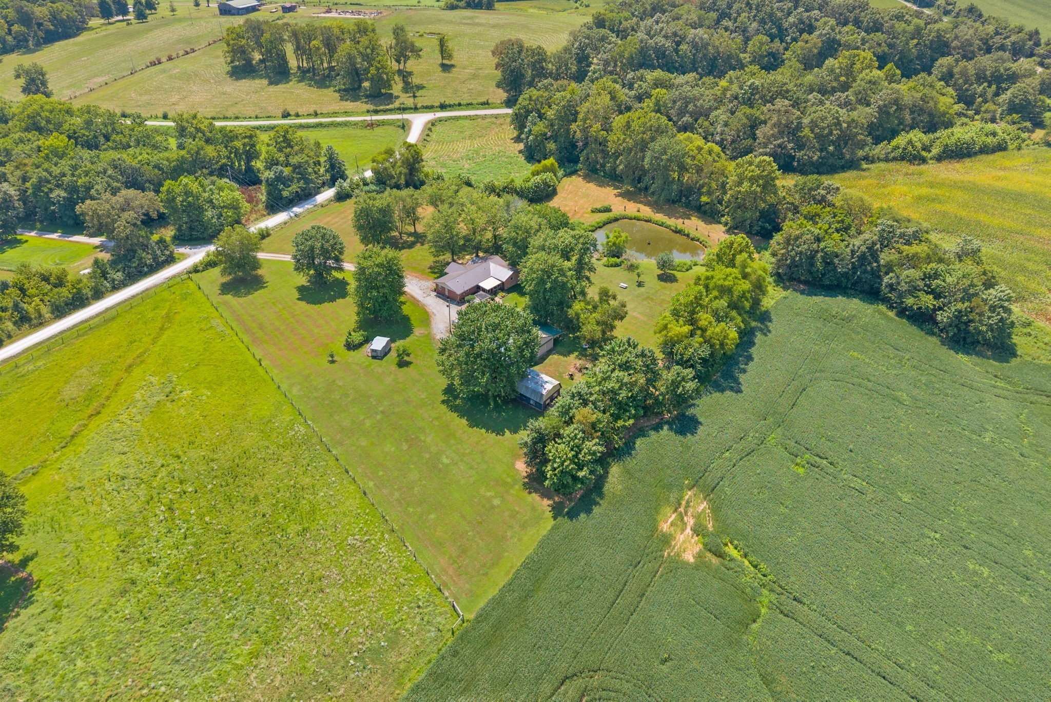 3680 Zentmyer Road Crofton, KY 42217 - Photo 42 of 43 a view of a lake with a yard