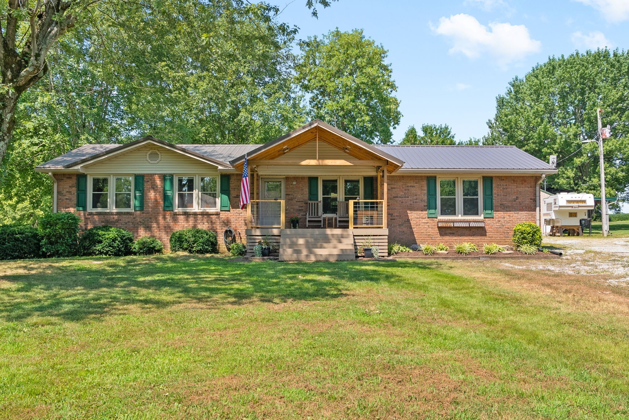 3680 Zentmyer Road Crofton, KY 42217 - Photo 6 of 43 a front view of a house with a yard