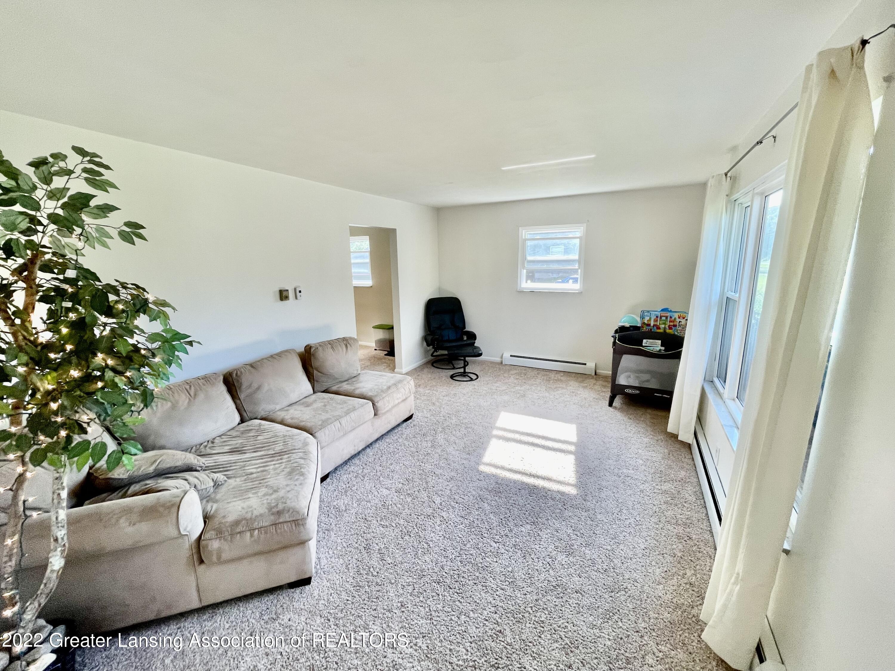 4316 Sleight Road Bath, MI 48808 - Photo 4 of 31 Living Room