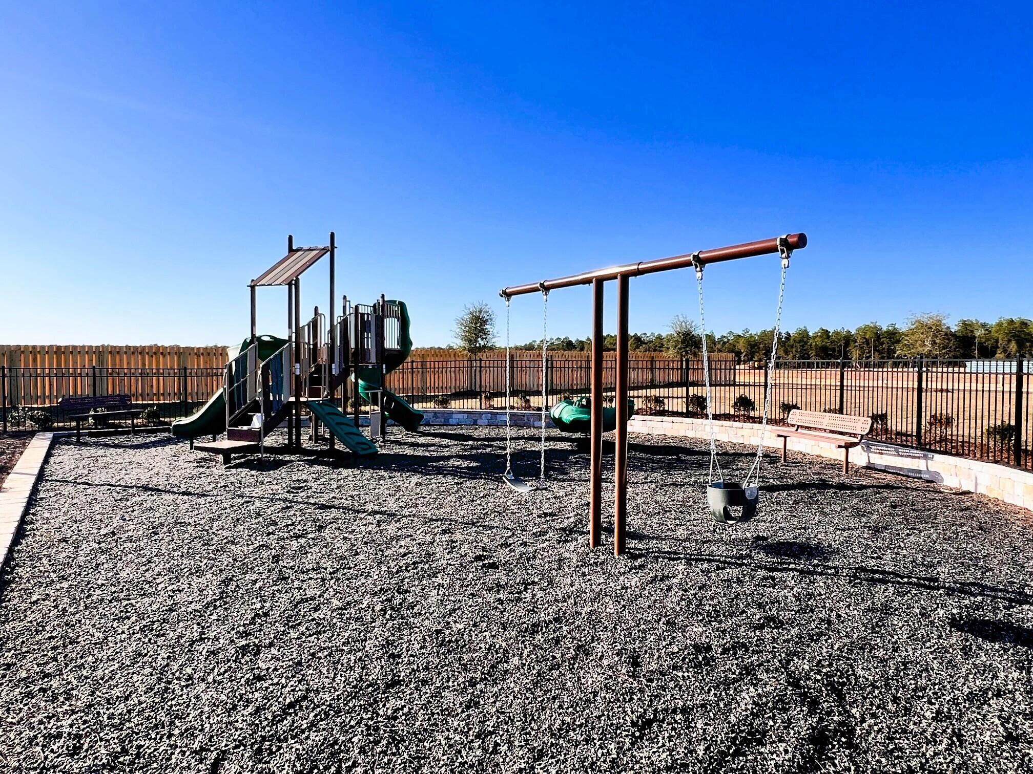 6274 June Bug Drive Milton, FL 32583 - Photo 4 of 17 a view of a swimming pool with lawn chairs
