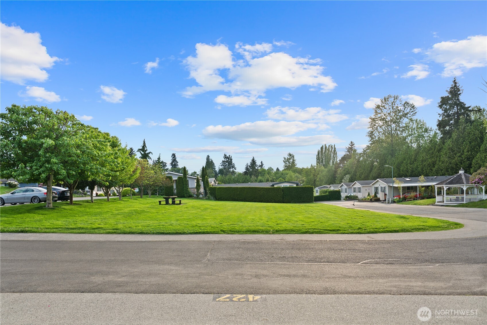 23825 15th Avenue Southeast, Unit 427 Bothell, WA 98021 - Photo 23 of 38 a view of a golf course with a lake