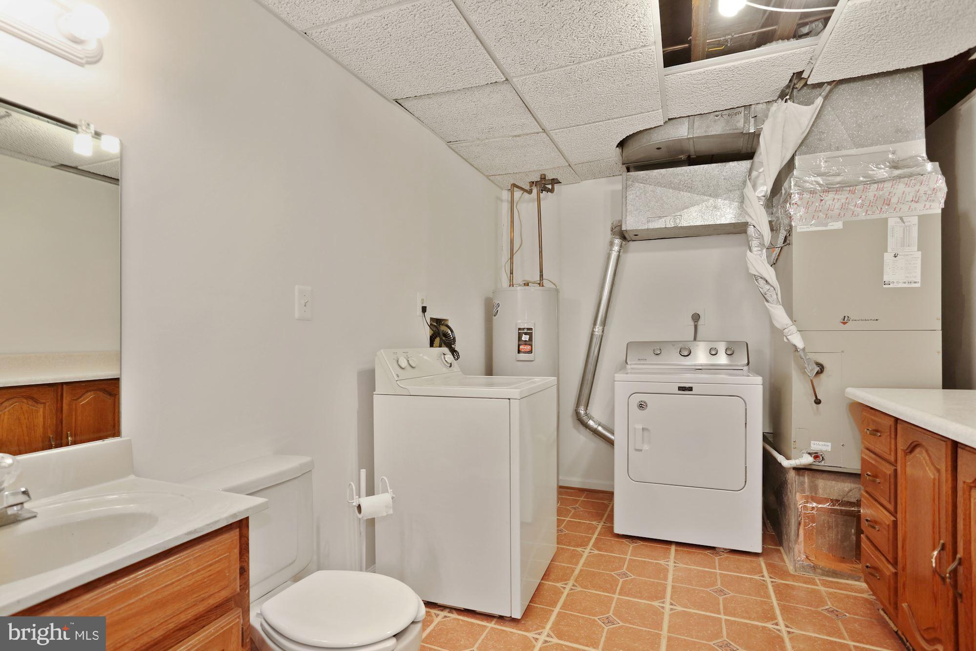 3829 Ferrara Drive Silver Spring, MD 20906 - Photo 23 of 29 Utility Room with bath