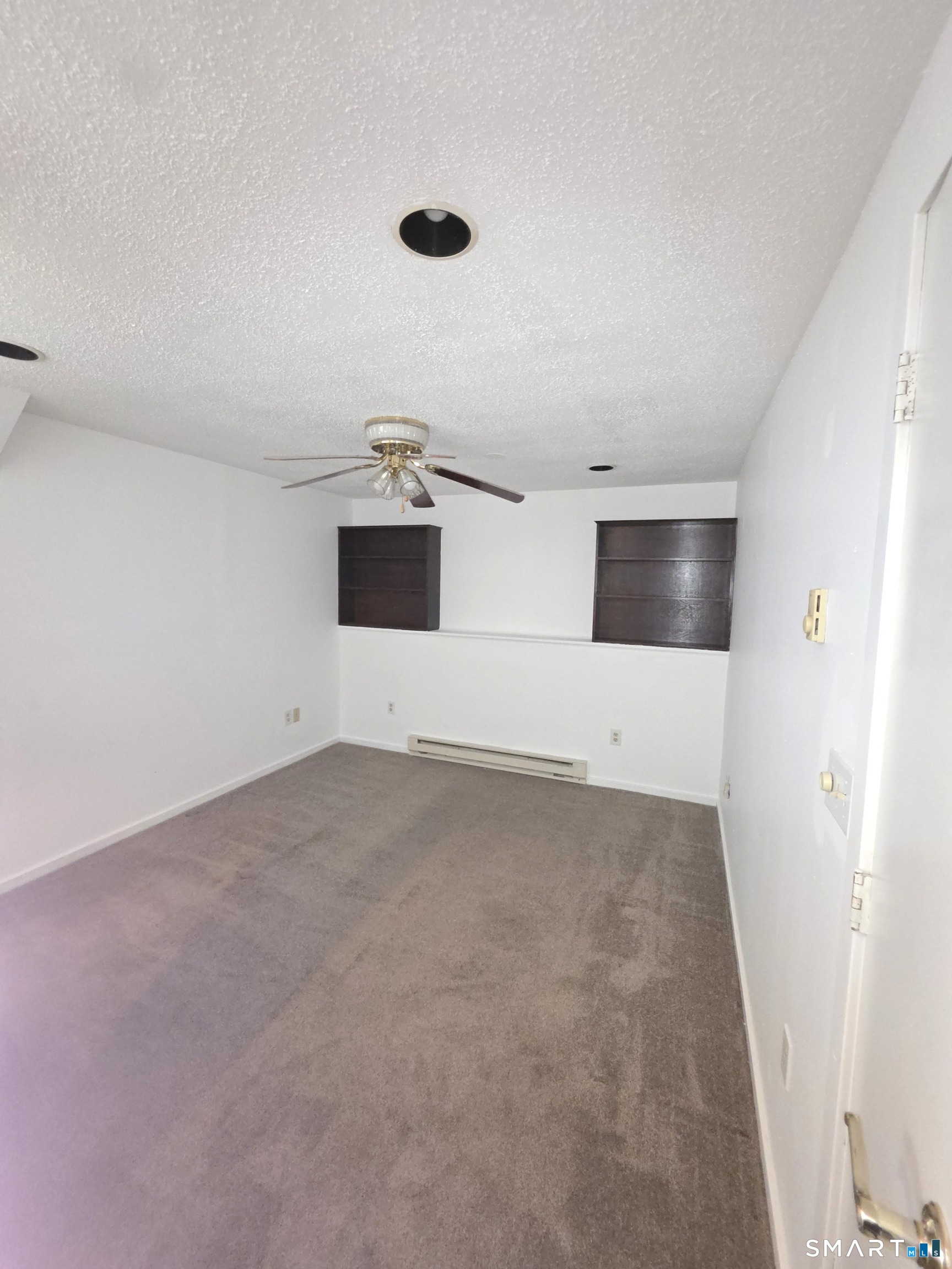 51 Brook Street, Unit 6A Naugatuck, CT 06770 - Photo 17 of 32 an empty room with windows