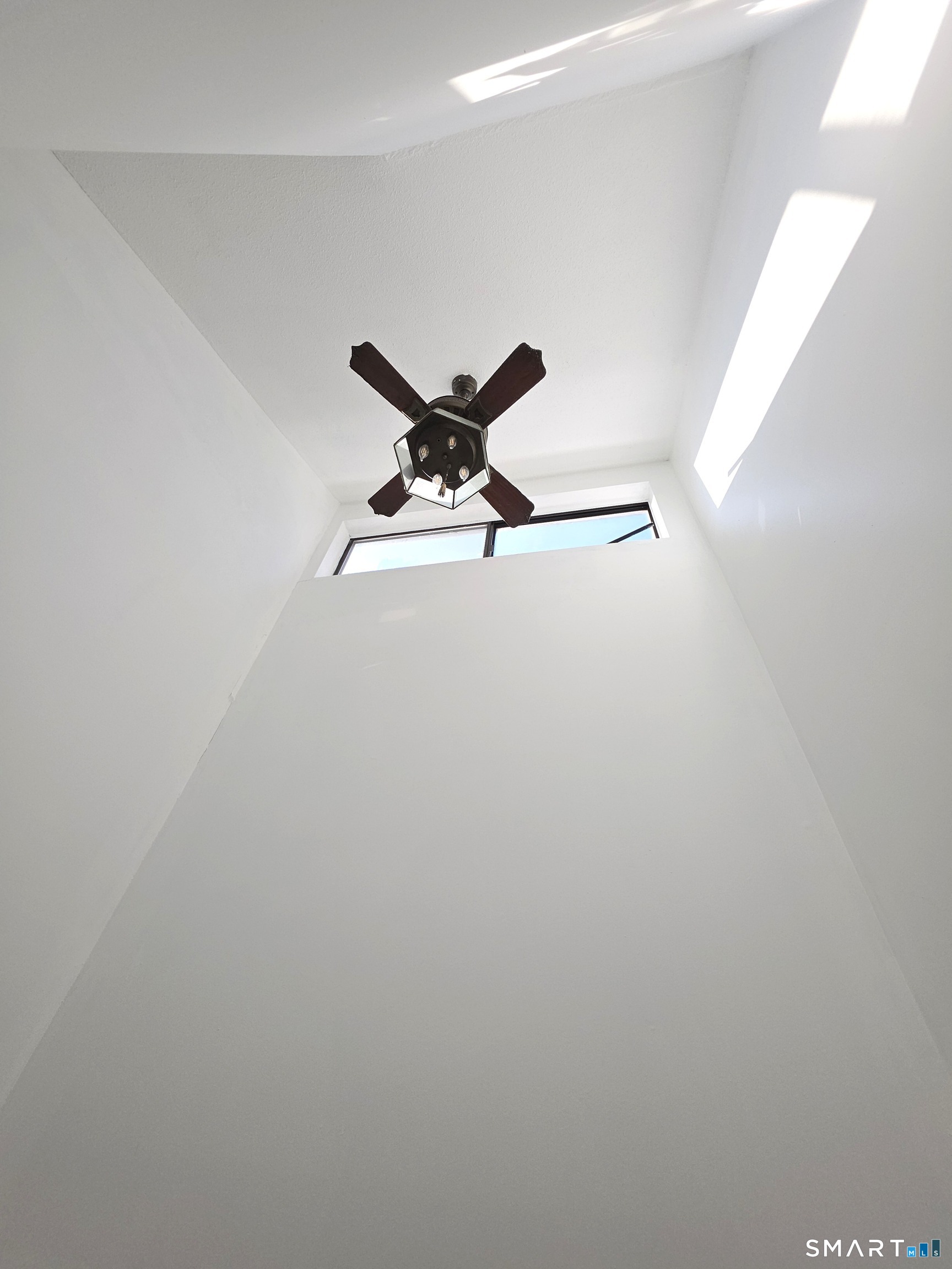 51 Brook Street, Unit 6A Naugatuck, CT 06770 - Photo 22 of 32 a a white wall with a window