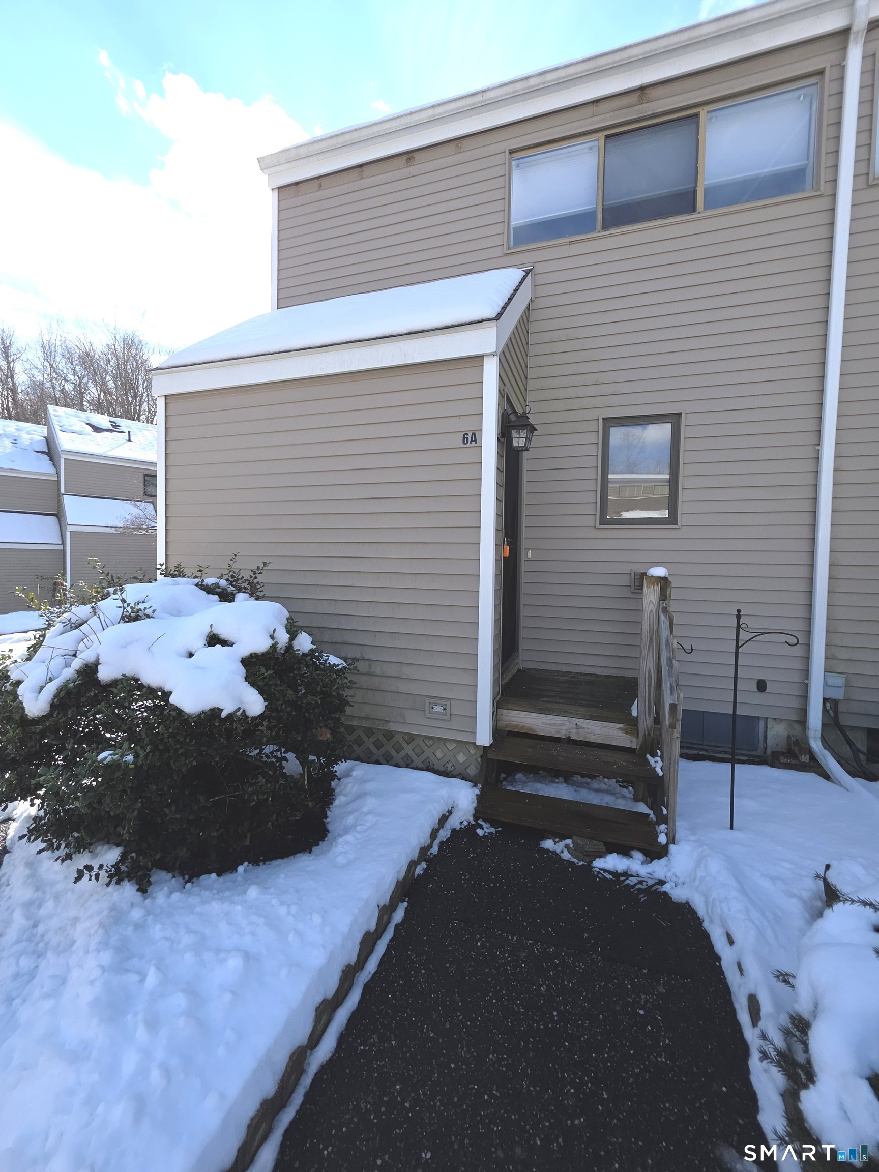 51 Brook Street, Unit 6A Naugatuck, CT 06770 - Photo 4 of 32 a view of a backyard