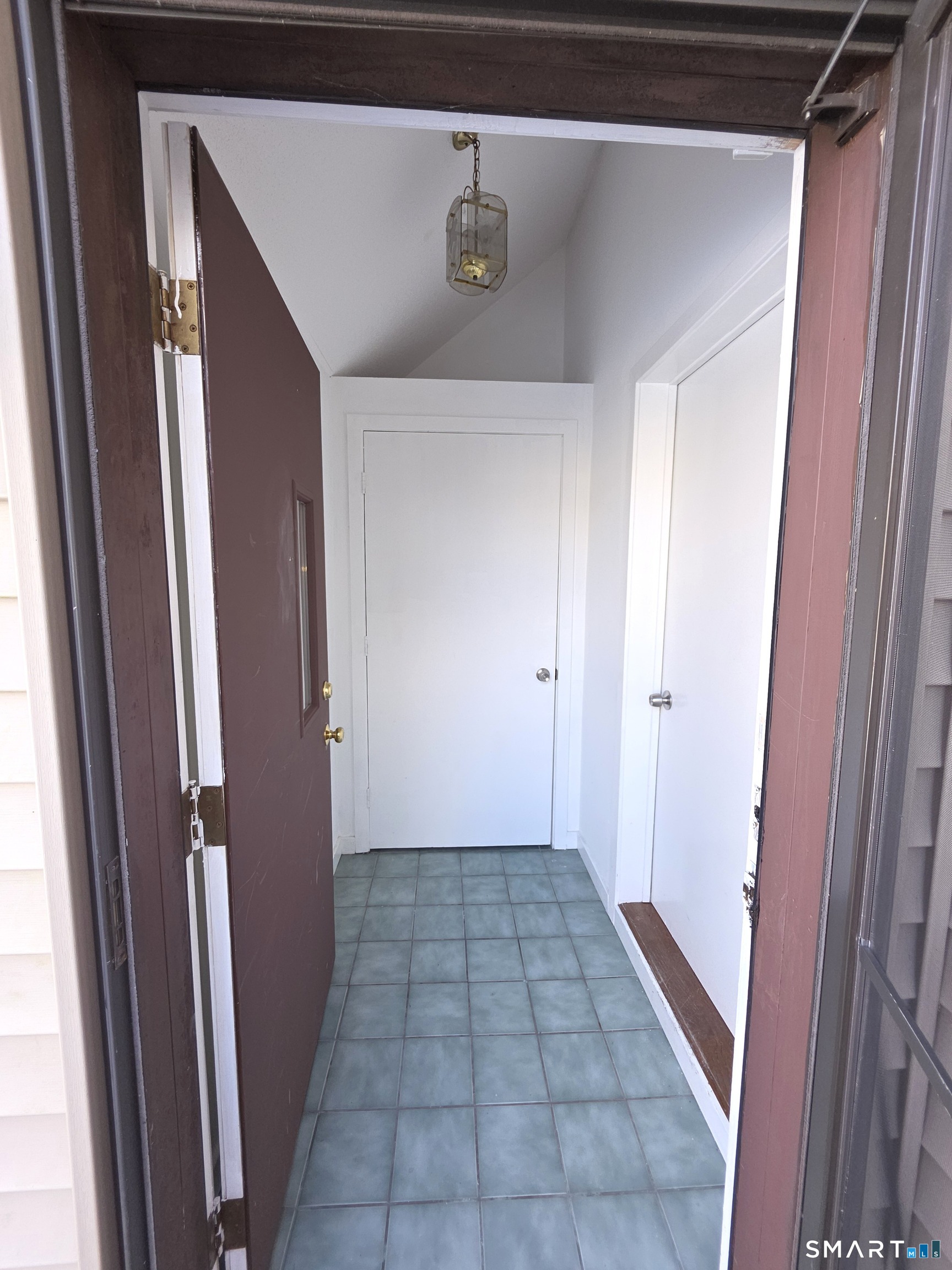 51 Brook Street, Unit 6A Naugatuck, CT 06770 - Photo 5 of 32 a view of a hallway with a door