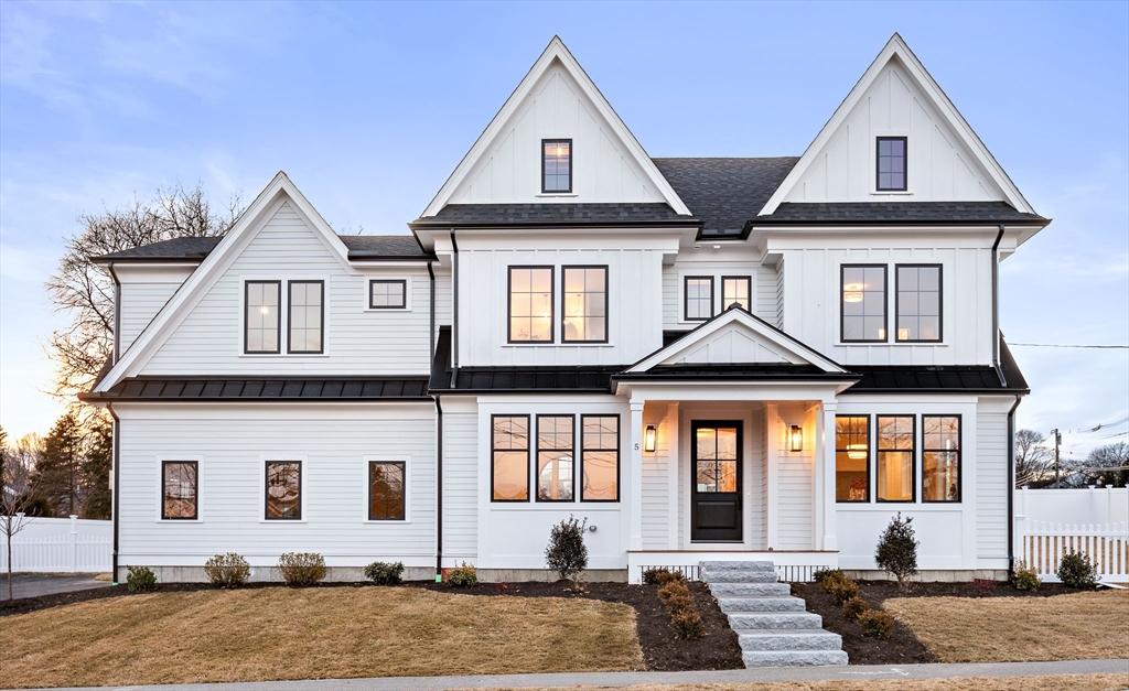 5 Hazel Lane Needham, MA 02494 - Photo 1 of 39 a front view of a house with a yard