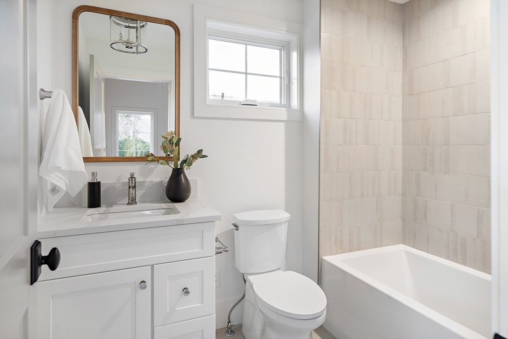 5 Hazel Lane Needham, MA 02494 - Photo 23 of 39 a bathroom with a sink a toilet and shower