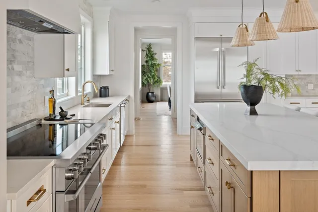 a kitchen with sink and stove