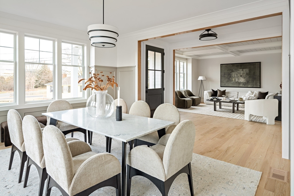 5 Hazel Lane Needham, MA 02494 - Photo 9 of 39 a view of a dining room with furniture window and outside view