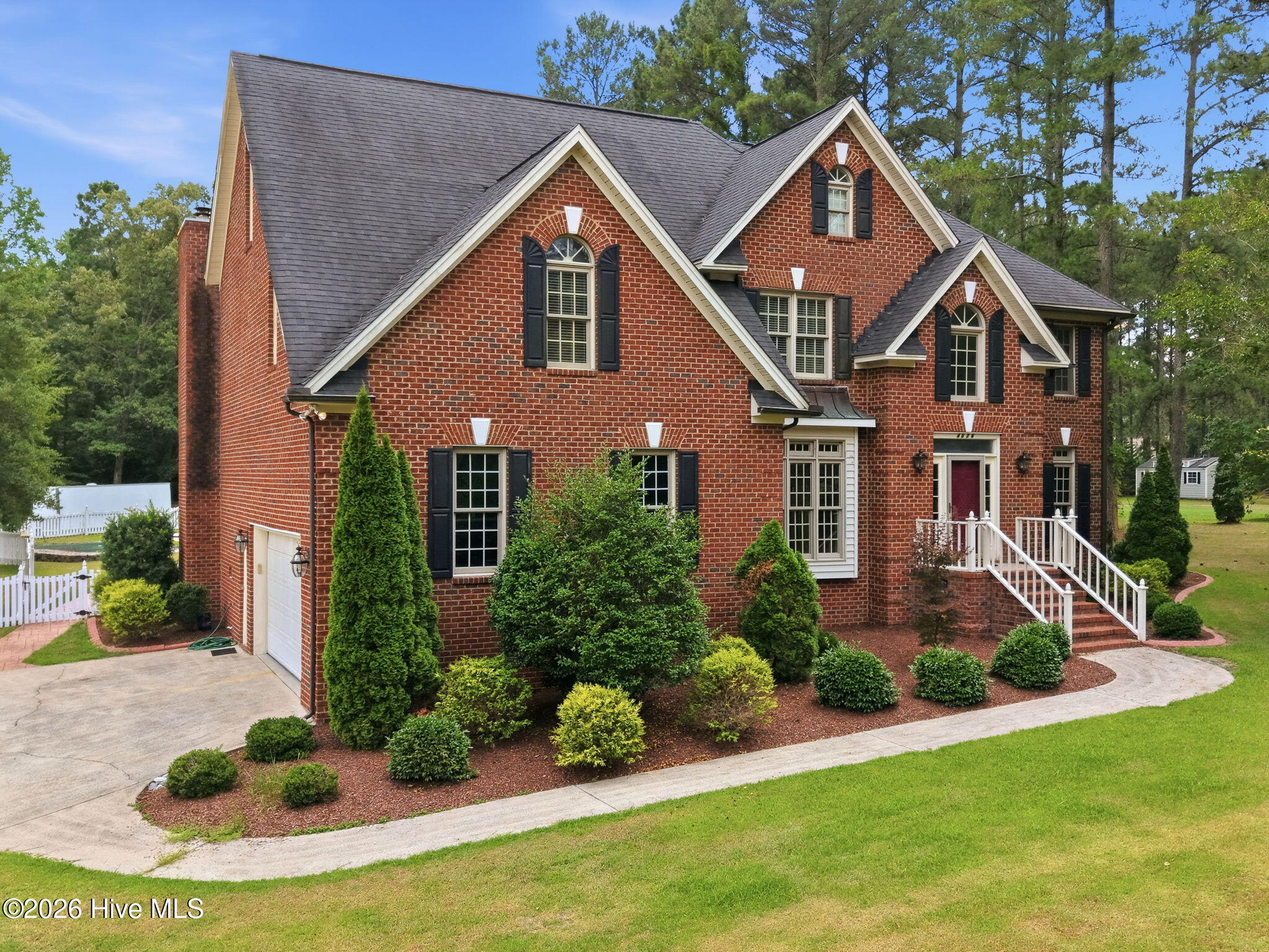 4076 Mobleys Bridge Road Grimesland, NC 27837 - Photo 2 of 66 Front, side load garage