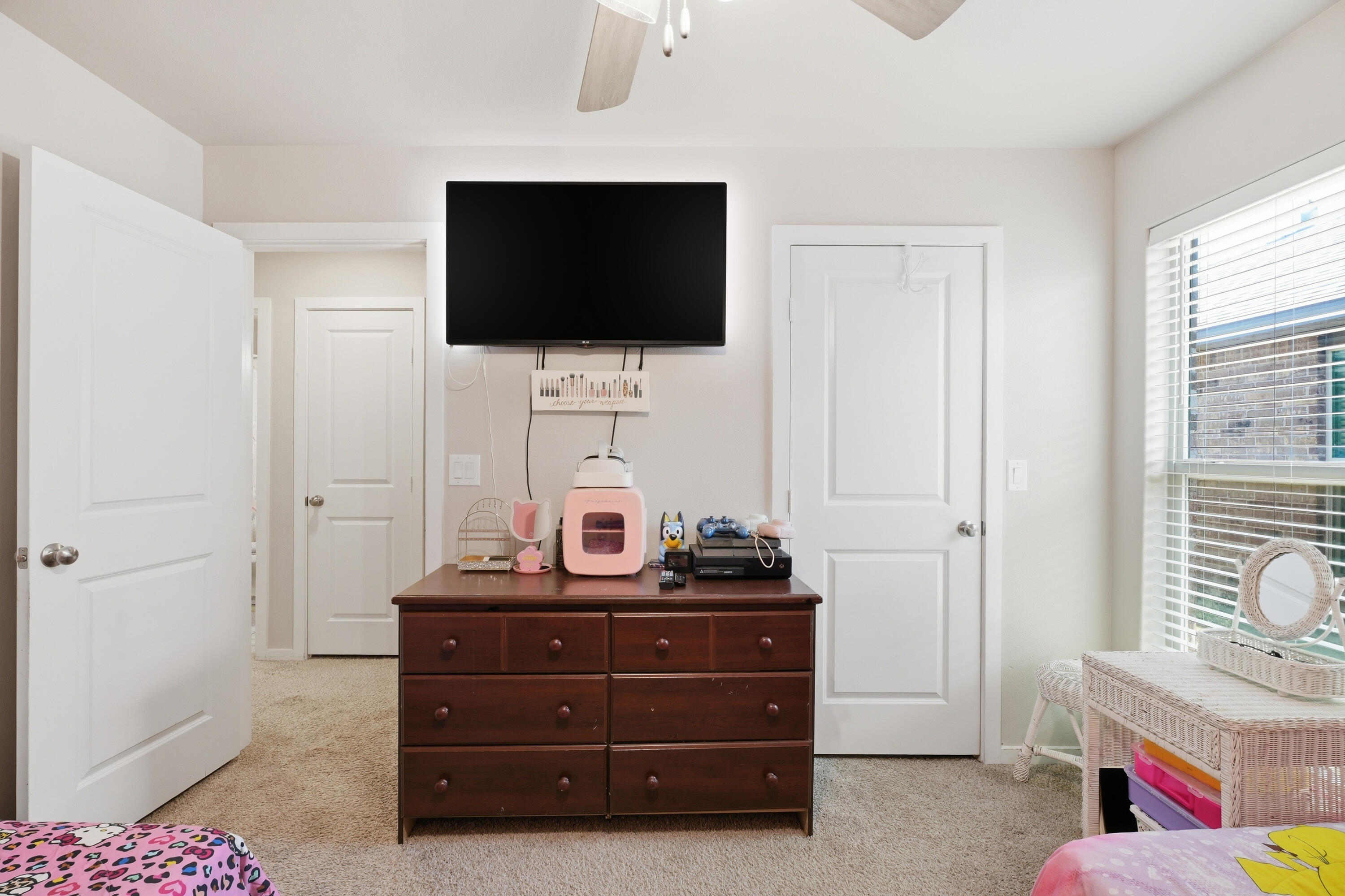 1919 140th Street Lubbock, TX 79423 - Photo 20 of 23 a living room with furniture and a flat screen tv