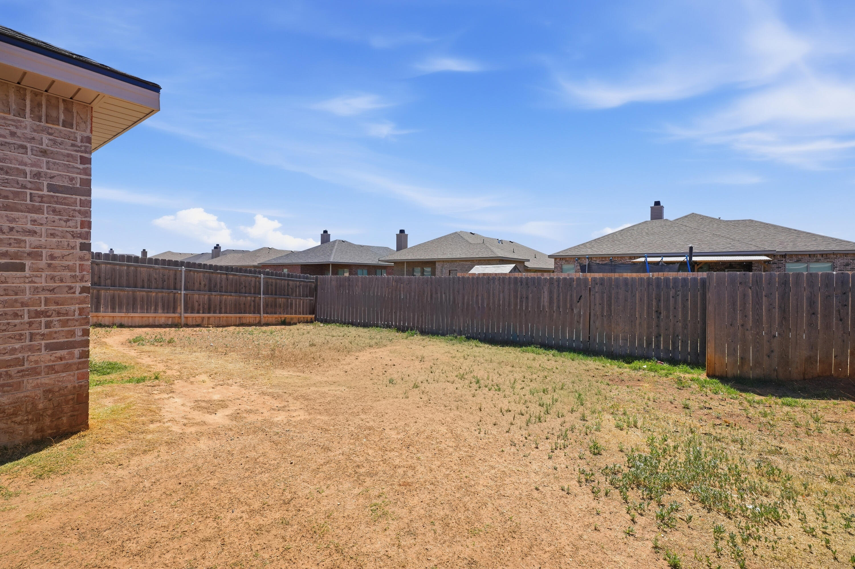 1919 140th Street Lubbock, TX 79423 - Photo 23 of 23 a view of a backyard