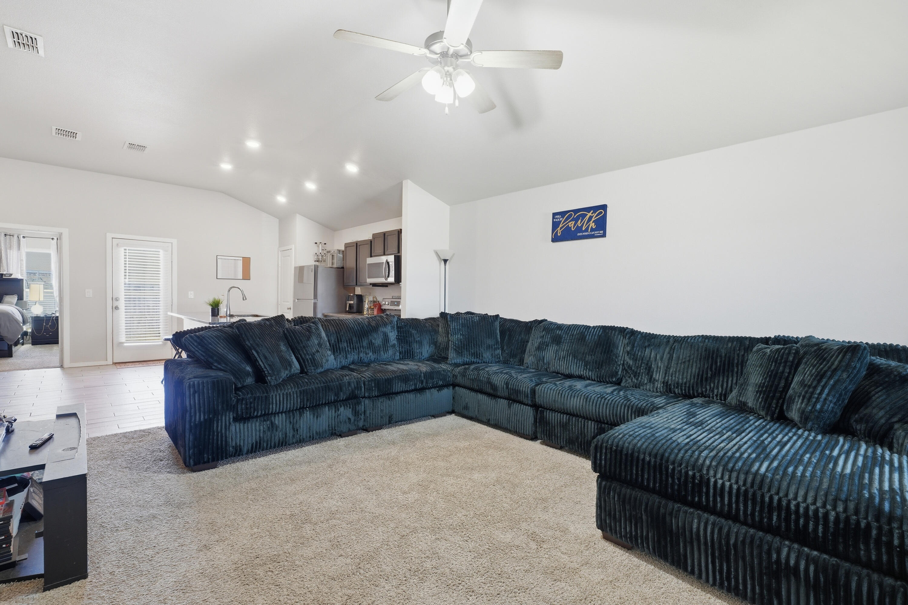 1919 140th Street Lubbock, TX 79423 - Photo 4 of 23 a living room with furniture and a couch