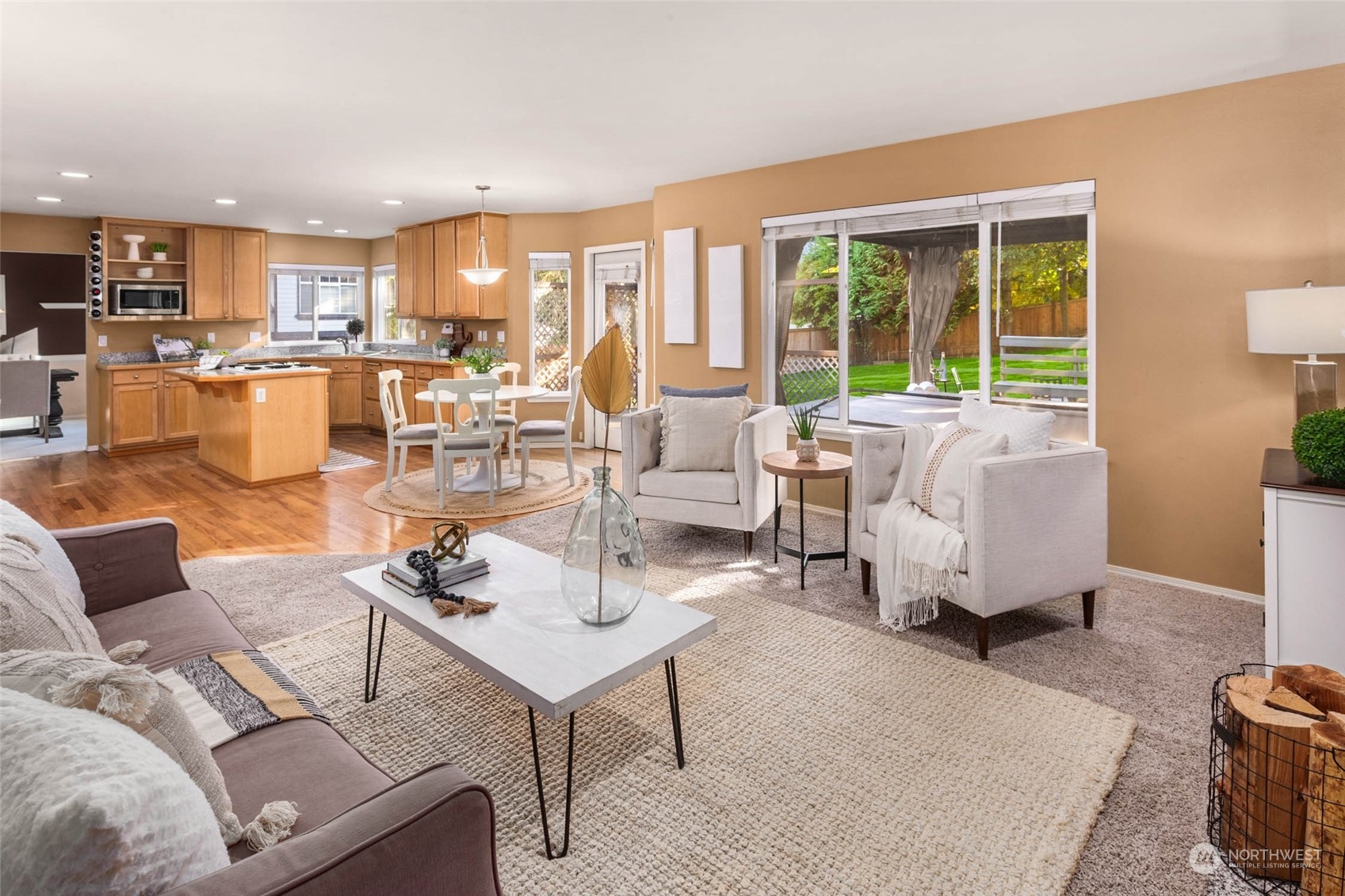 2710 236th Street Southeast Bothell, WA 98021 - Photo 11 of 30 a living room with furniture and a large window