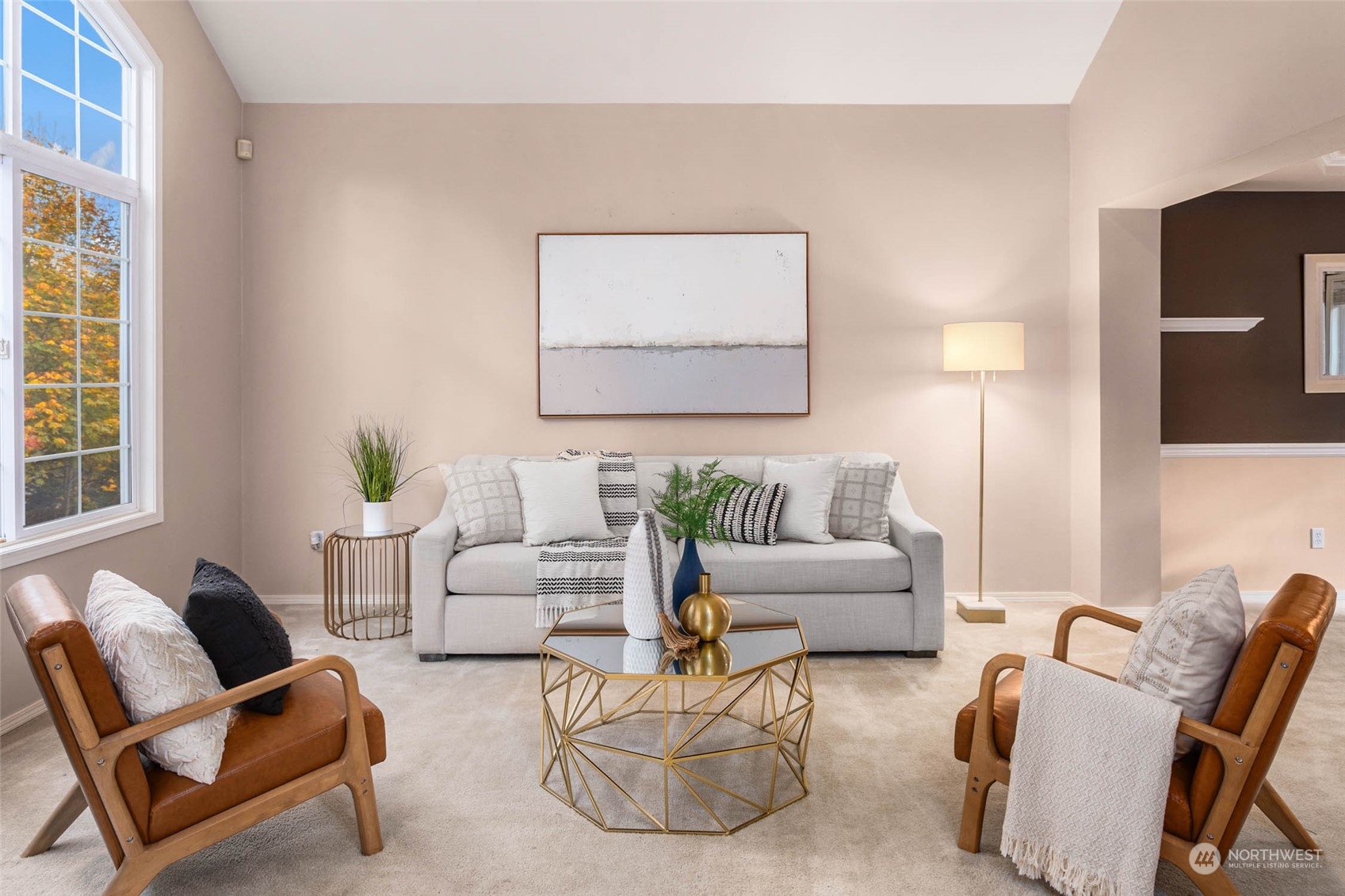 2710 236th Street Southeast Bothell, WA 98021 - Photo 2 of 30 a living room with furniture and a potted plant
