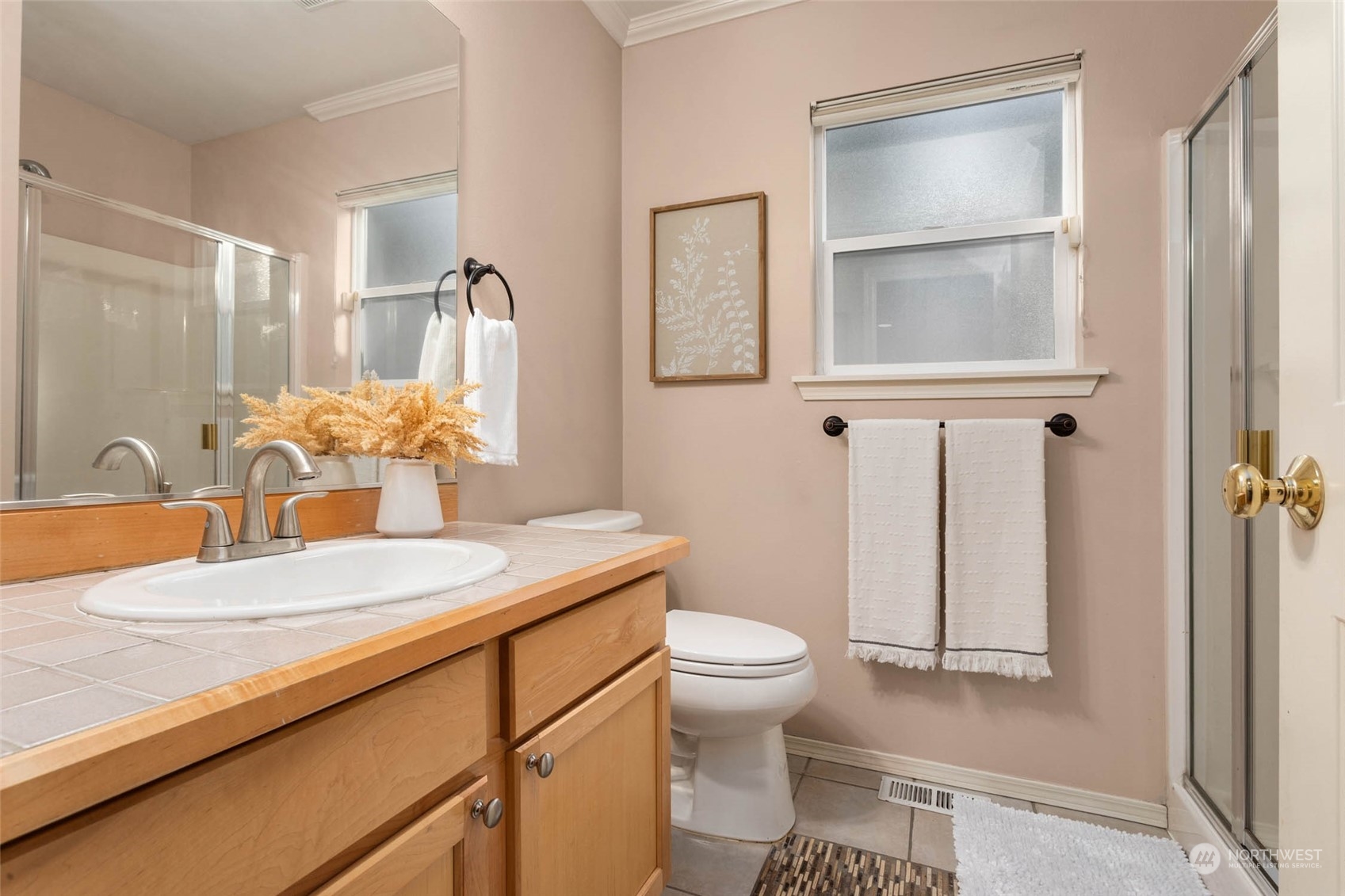 2710 236th Street Southeast Bothell, WA 98021 - Photo 23 of 30 a bathroom with a granite countertop sink mirror vanity and toilet