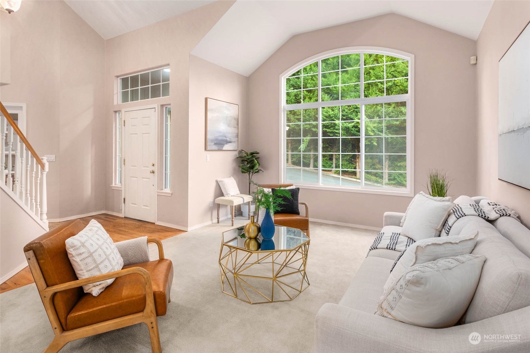 2710 236th Street Southeast Bothell, WA 98021 - Photo 3 of 30 a living room with furniture and floor to ceiling windows