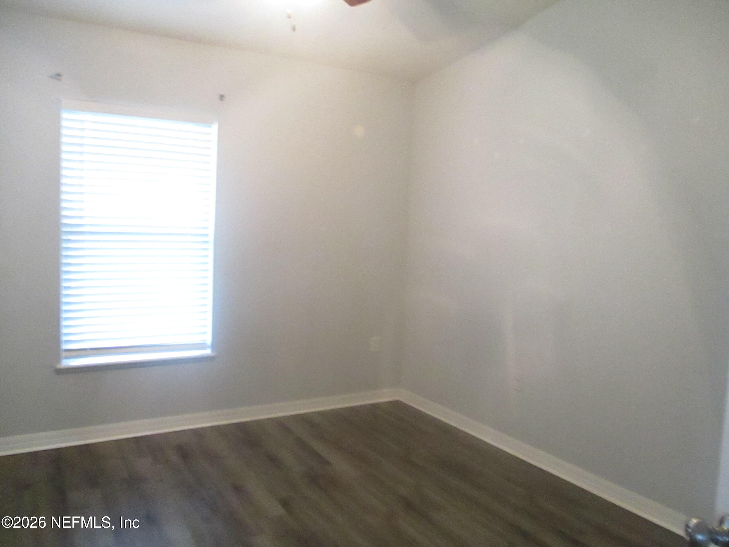 738 North 5th Street Macclenny, FL 32063 - Photo 13 of 23 an empty room with a window