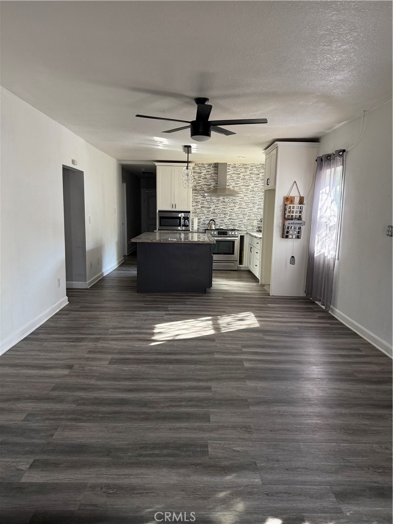 242 East M Street Colton, CA 92324 - Photo 19 of 19 a living room with hard wood floors
