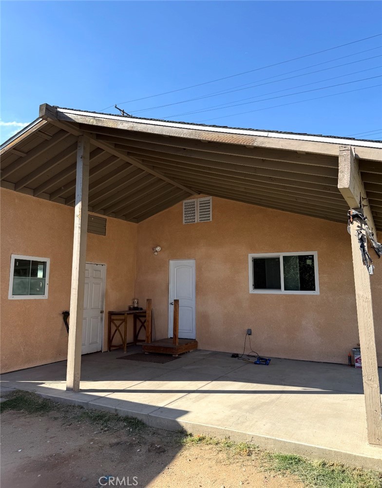 242 East M Street Colton, CA 92324 - Photo 8 of 19 a view of house with yard