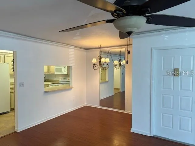a view of a livingroom with wooden floor
