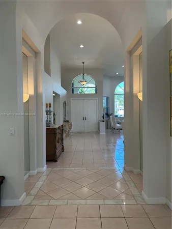 a view of kitchen with furniture and window