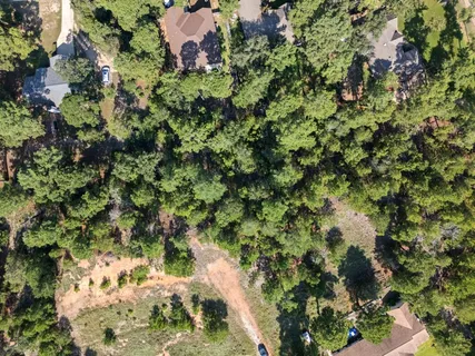 a view of city with green space