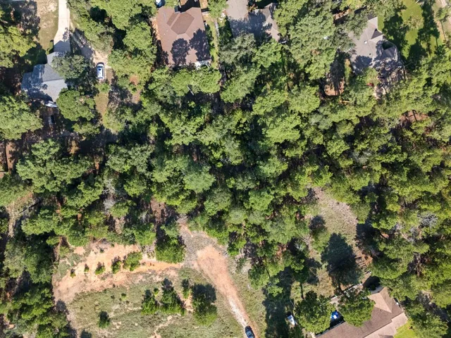 a view of city with green space
