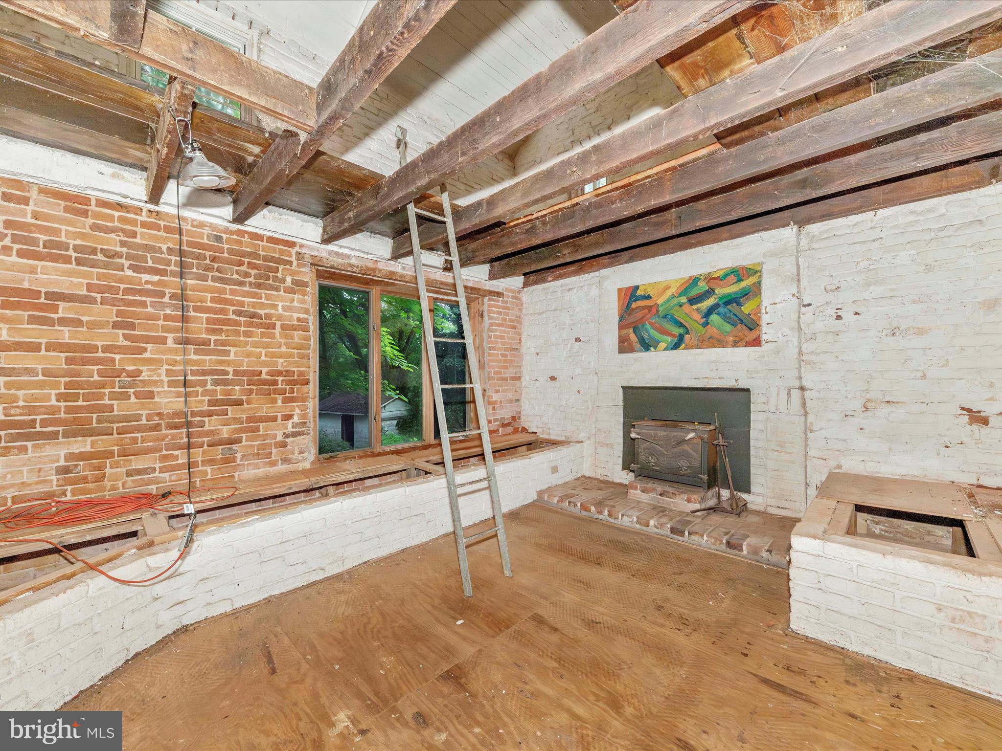 6753 Dickerson Road Dickerson, MD 20842 - Photo 17 of 49 Artwork Room with full loft and exposed beam