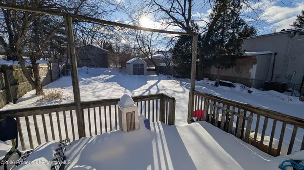 a view of balcony with furniture