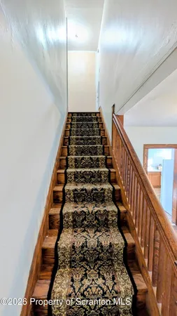 a view of a street with cars