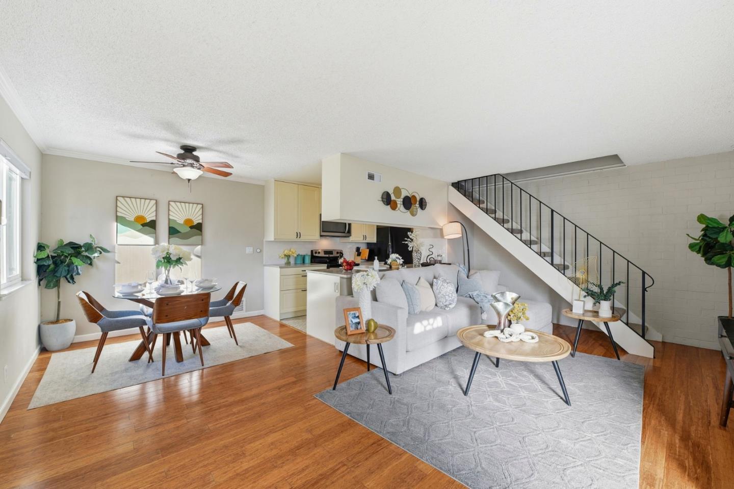 5701 Calmor Avenue, Unit 2 San Jose, CA 95123 - Photo 2 of 10 a living room with furniture dining table and wooden floor