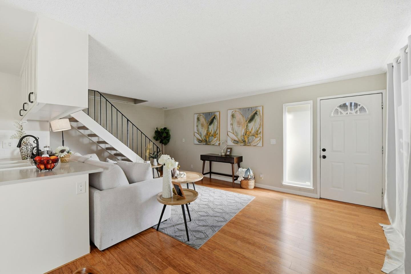 5701 Calmor Avenue, Unit 2 San Jose, CA 95123 - Photo 3 of 10 a living room with furniture and a wooden floor
