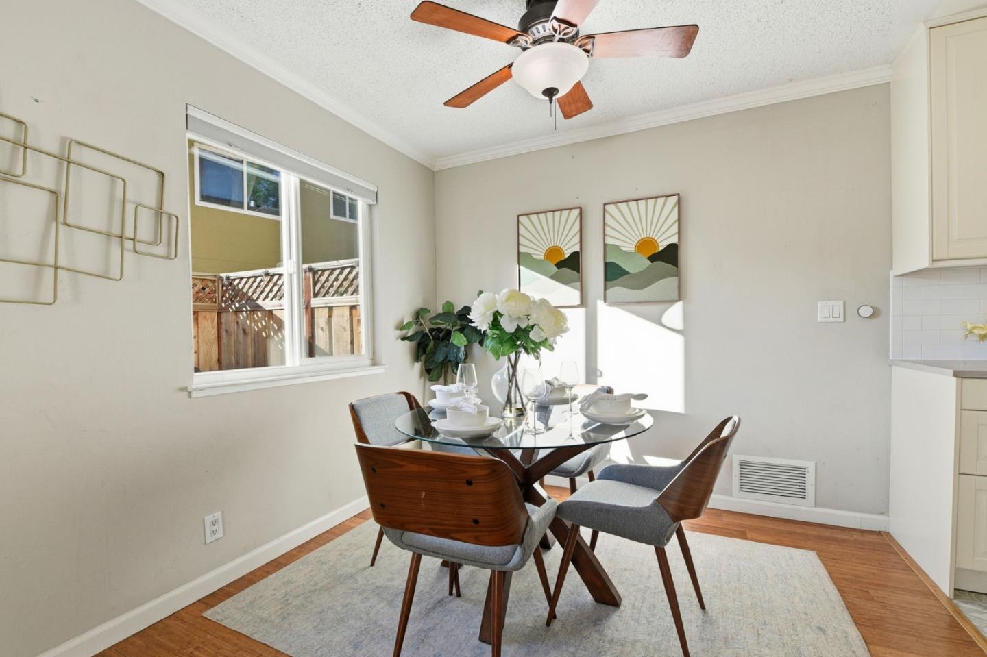 5701 Calmor Avenue, Unit 2 San Jose, CA 95123 - Photo 6 of 10 a dining room with furniture and window