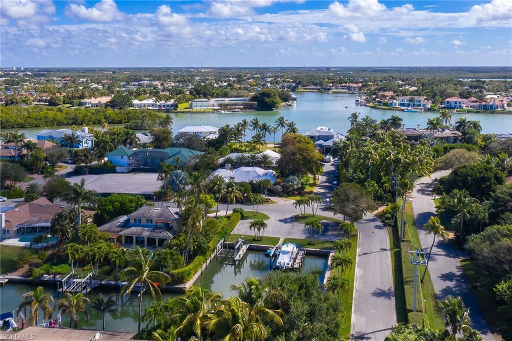 12 Sabre Lane Naples, FL 34102 - Photo 12 of 17 an aerial view of residential houses with outdoor space