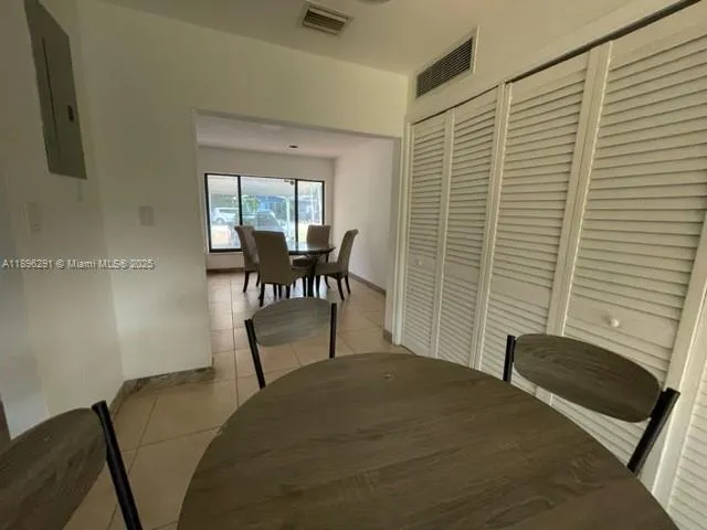 a view of a livingroom with furniture and window