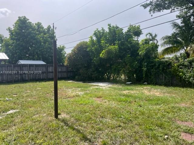 6141 Wiley Street Hollywood, FL 33023 - Photo 18 of 27 a view of a garden
