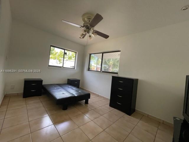 6141 Wiley Street Hollywood, FL 33023 - Photo 21 of 27 a living room with furniture and a window