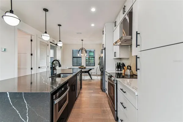 a table with a vase and a vase on it with a dining table