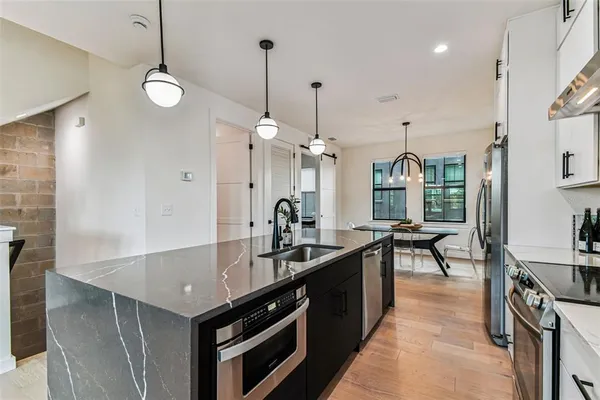 a dining room with furniture and window